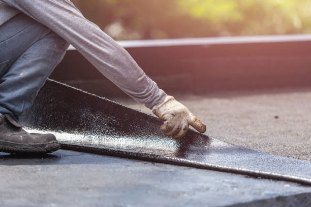 Professional Waterproofing technician working in Hobart, WI